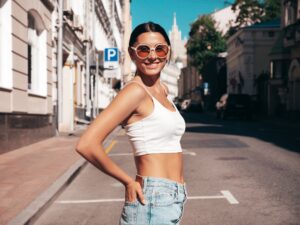 Young beautiful woman posing outdoors
